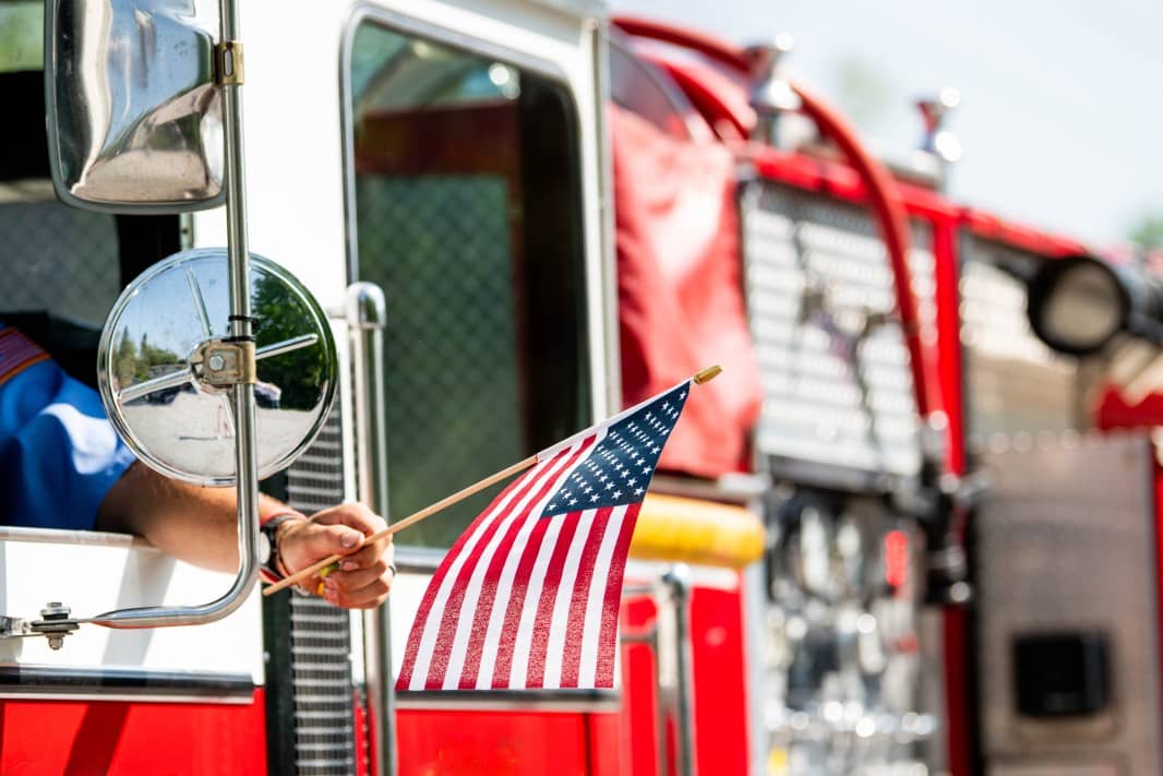American flag displayed from a fire truck