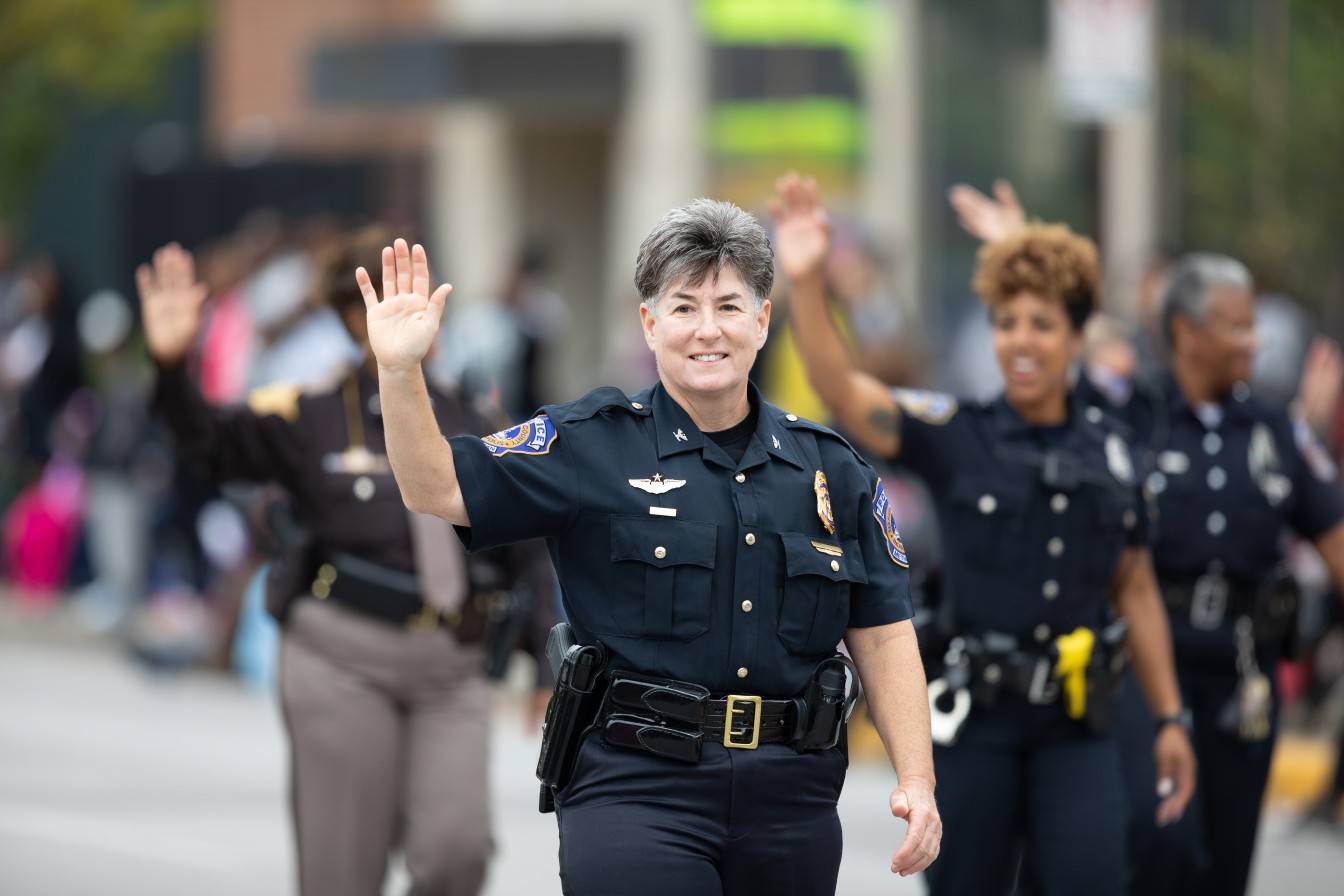 Police officers community parade outreach