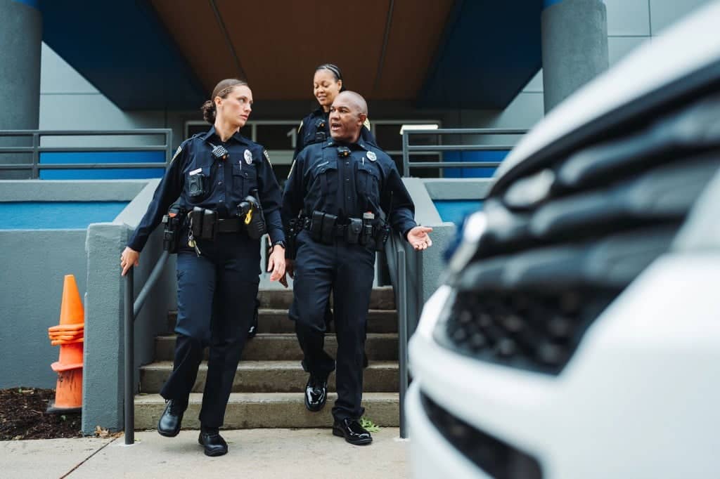 Police officers walking to patrol vehicle